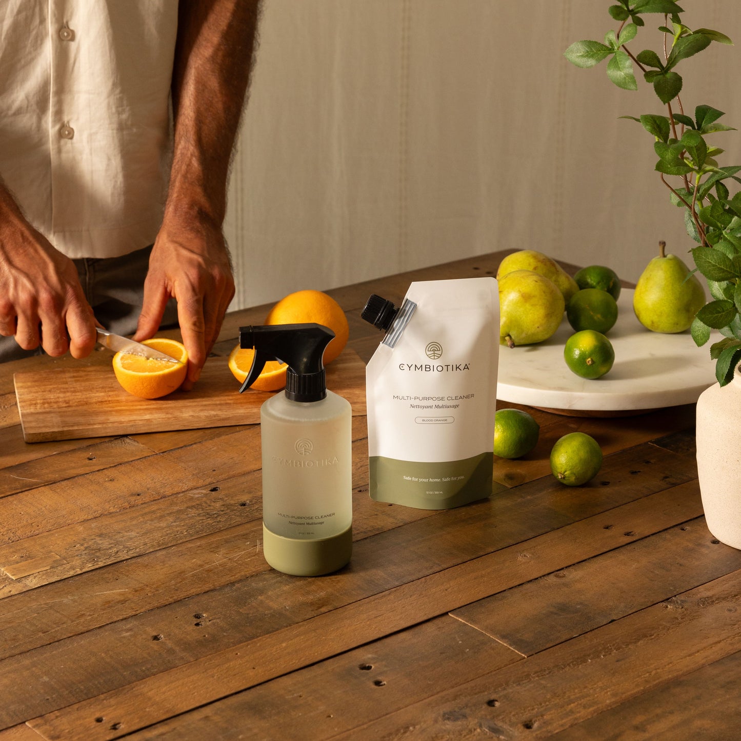 Multi-Purpose Cleaner Kit next to Oranges being cut